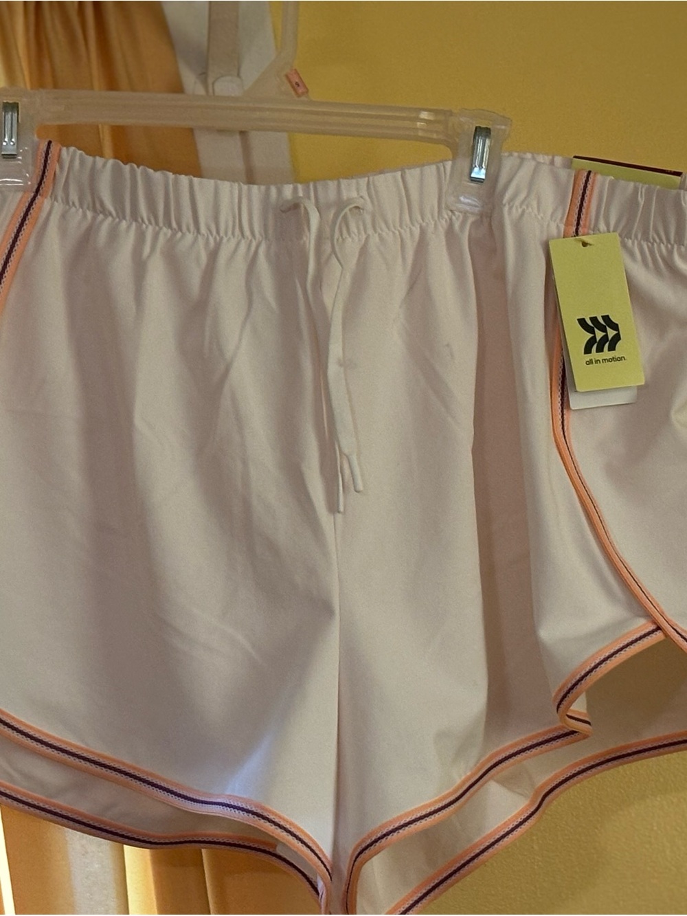 all in motion White Men’s Athletic Shorts with Pink Trim